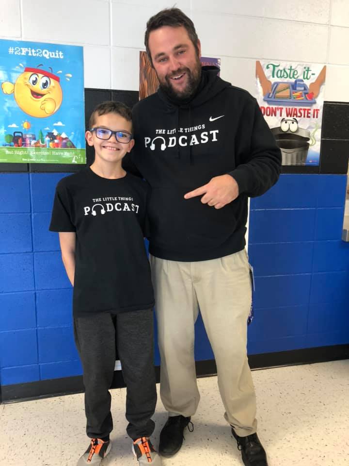 Mitch Reed with a student 